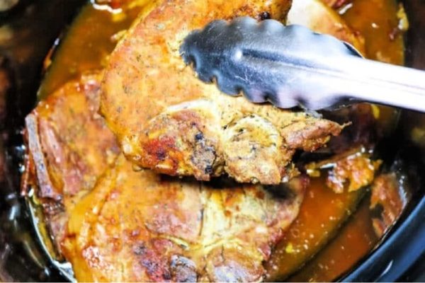 Slow cooker pork chops - crock pot pork chops stock videos & royalty-free footage.