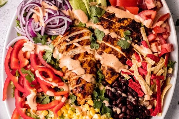 Mexican chicken salad on a white plate.