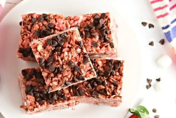 Strawberry granola bars on a white plate.