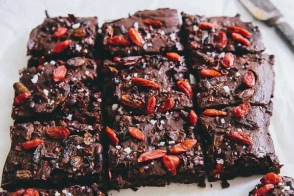 Indulge in decadent chocolate brownies infused with the tangy sweetness of goji berries and a hint of salt.
