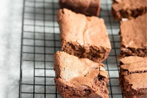 Delicious chocolate brownies cooling on a rack.