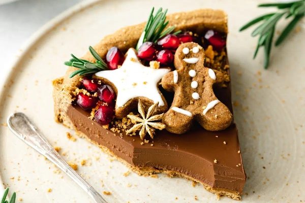 A slice of chocolate gingerbread pie on a plate, perfect for Christmas desserts.