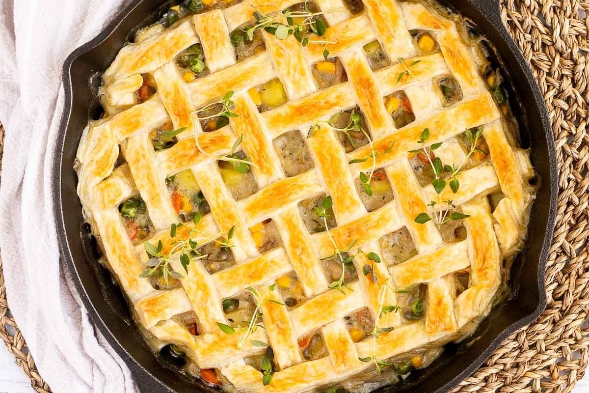 A cast iron skillet with a savory pie in it.