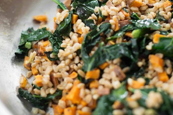 Colorful Farro Salad with sweet potatoes and kale.