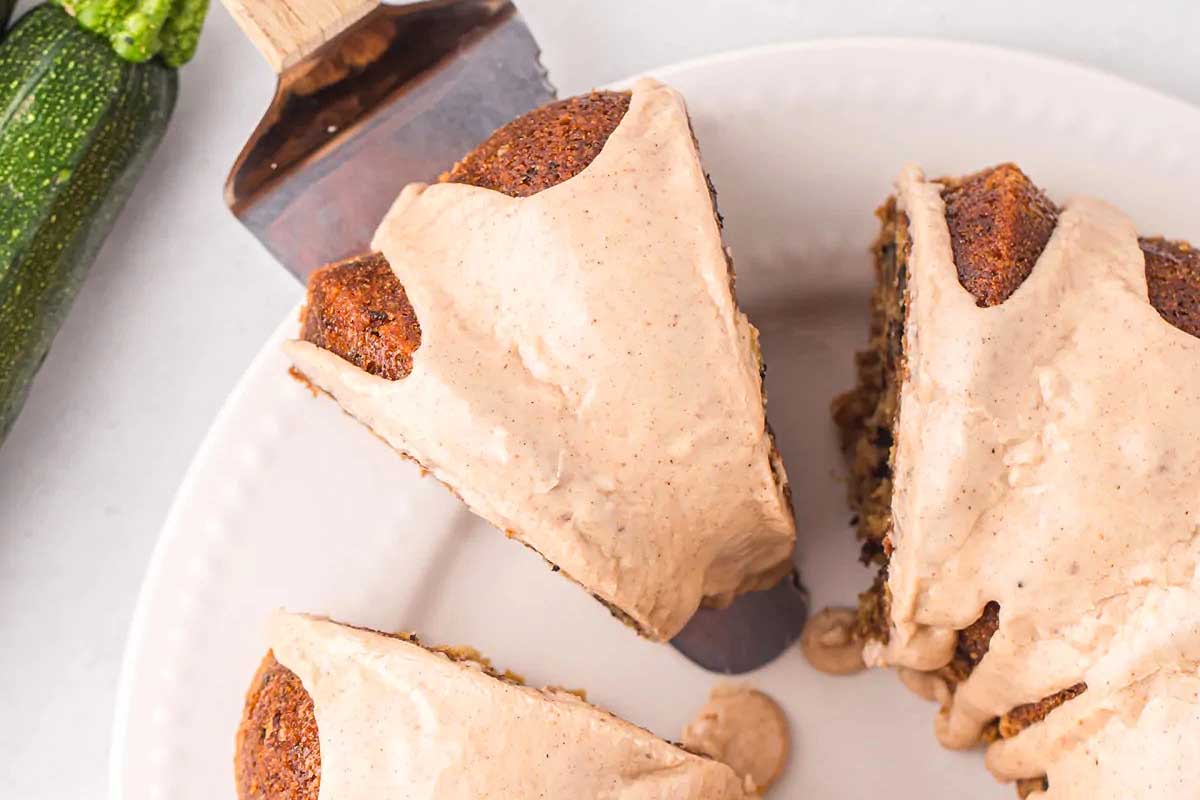 A slice of zucchini cake on a plate.