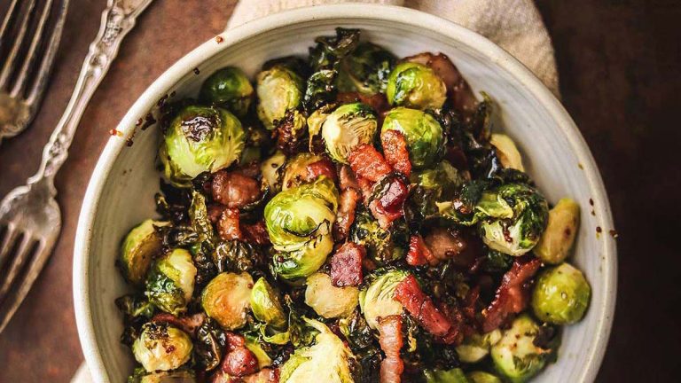Brussels sprouts in a white bowl.