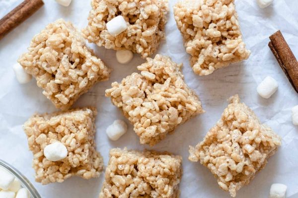 Rice krispie squares with cinnamon sticks.