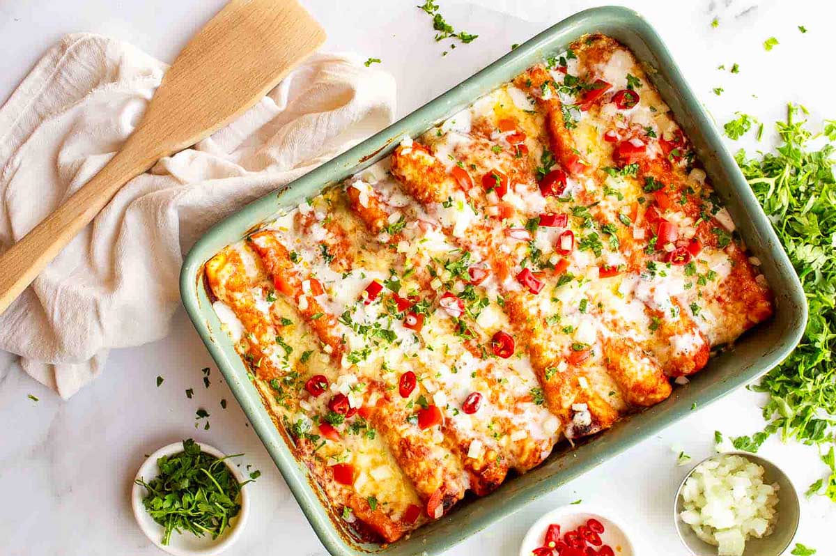 Mexican enchiladas in a baking dish.