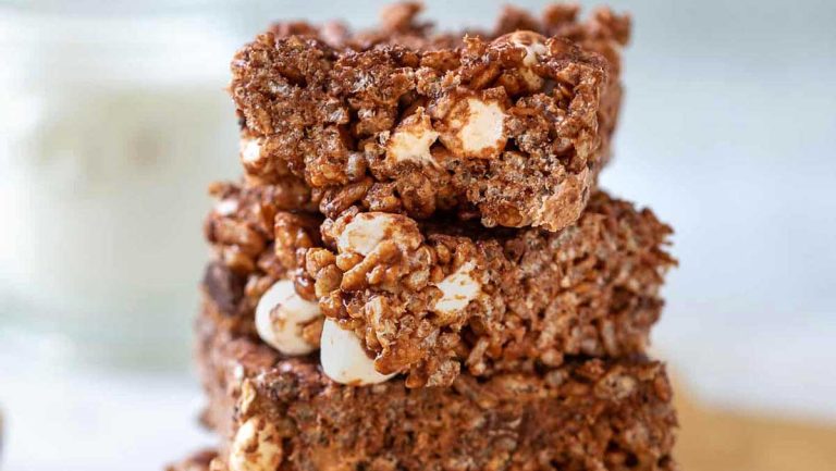 A stack of chocolate granola bars stacked on top of each other.