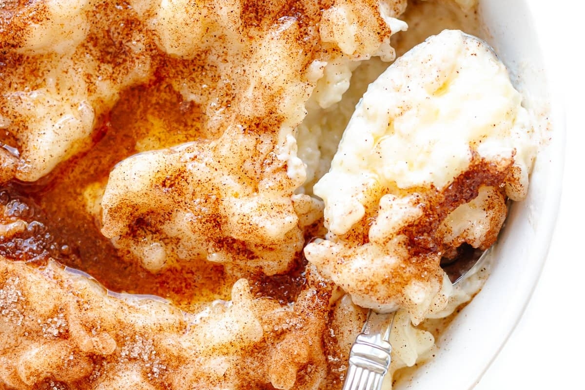 A German recipe for mashed potatoes served with a spoon.