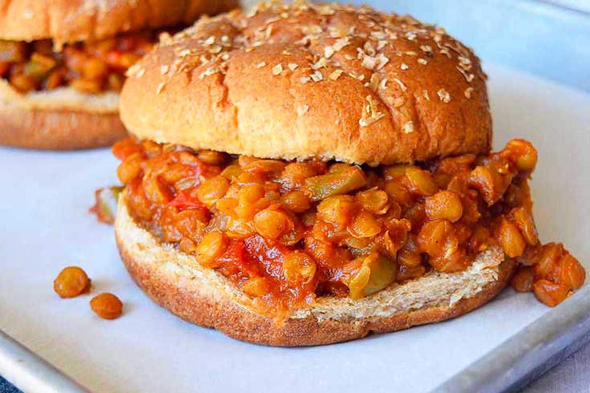 Lentil burgers on a baking sheet.