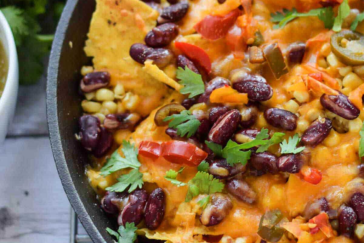 Authentic Mexican nachos served as pub food in a skillet.