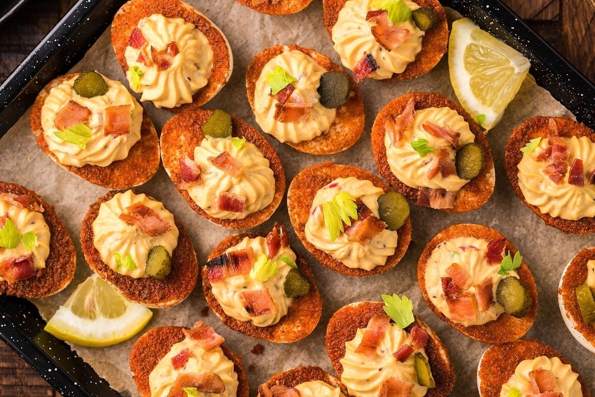 A tray of appetizers on a wooden table.