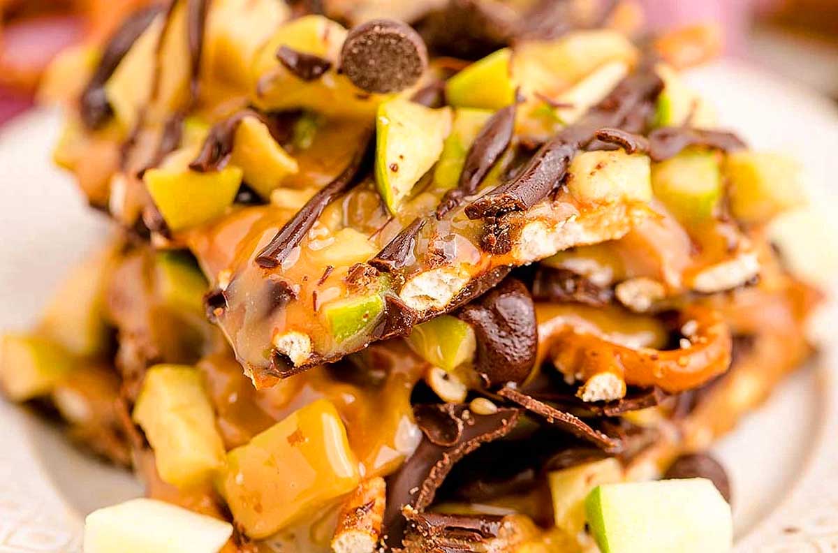 A stack of apple and caramel bark on a plate.