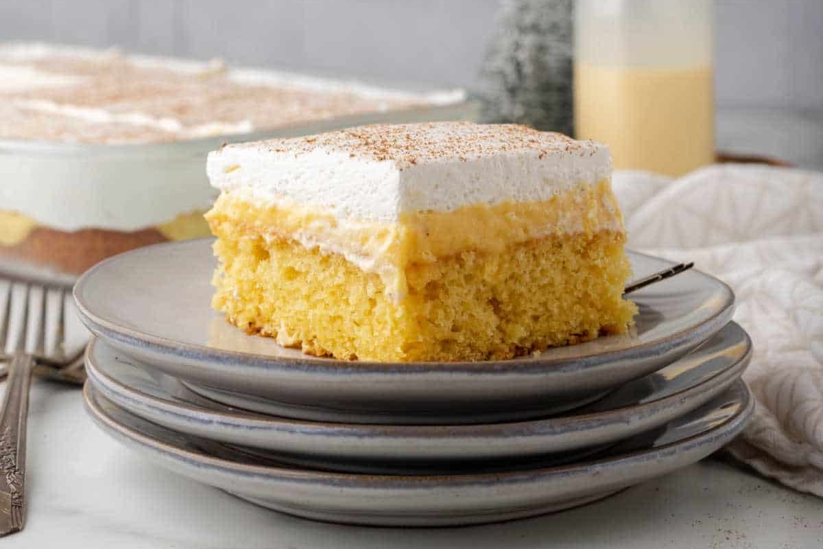 A slice of banana pudding cake on a plate, perfect for indulging in your favorite recipes.