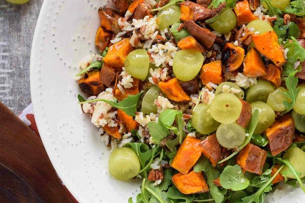         Vegan sweet potato and grape salad, perfect for Thanksgiving.