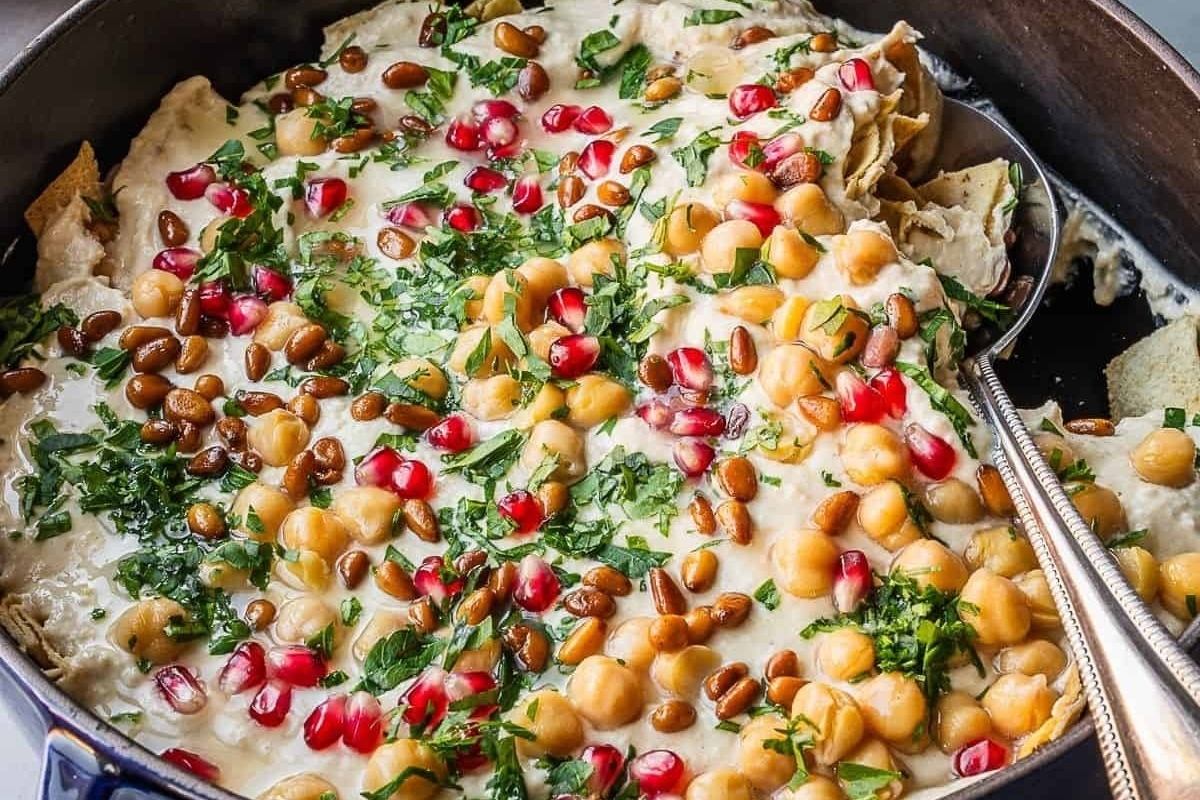 Pomegranate recipes for chickpea and pomegranate nachos.