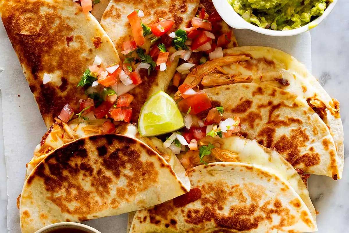 Chicken quesadillas with guacamole and guacamole.