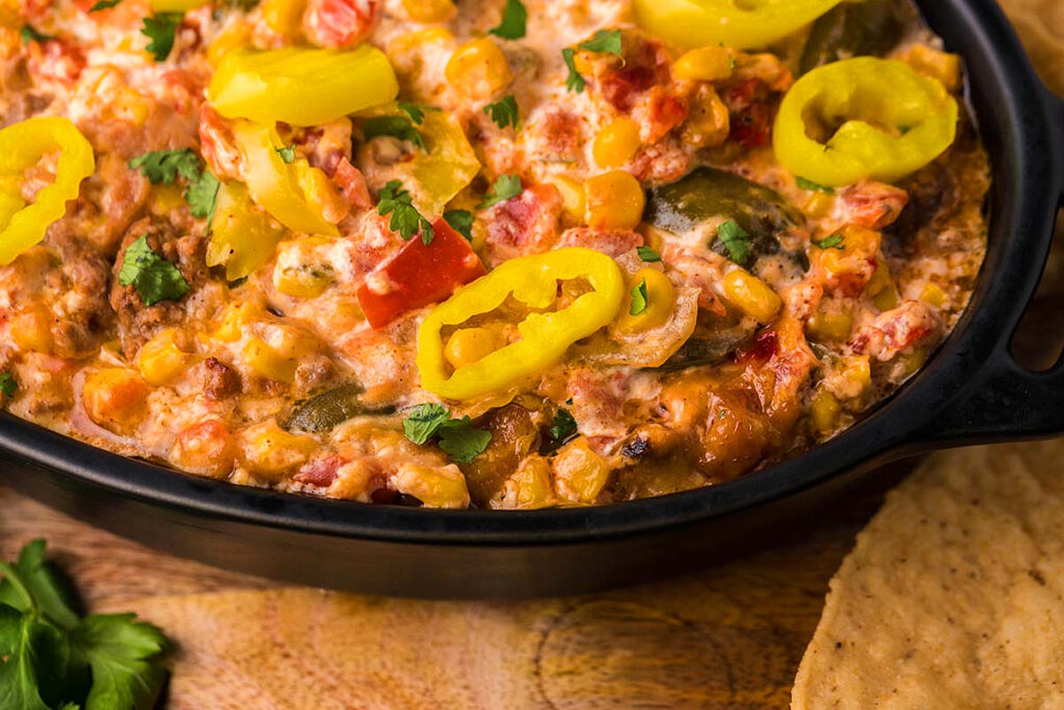 Mexican corn dip in a skillet.