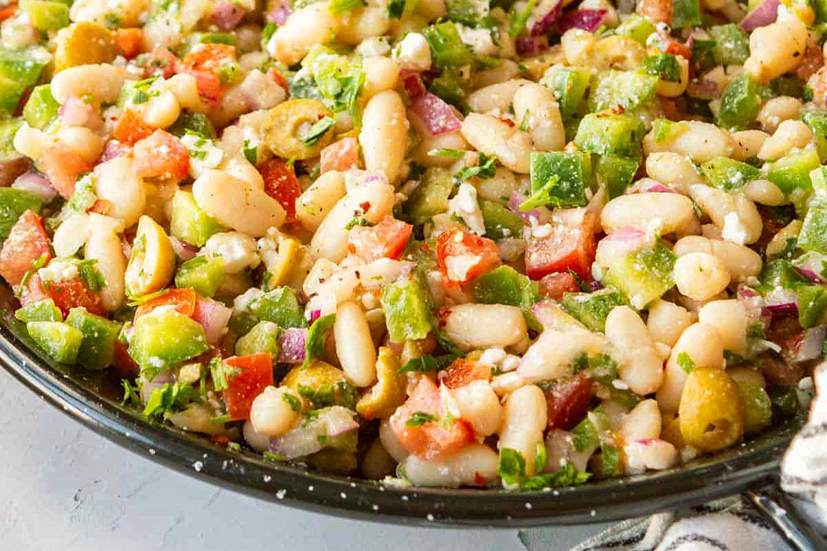 White bean salad in a skillet.
