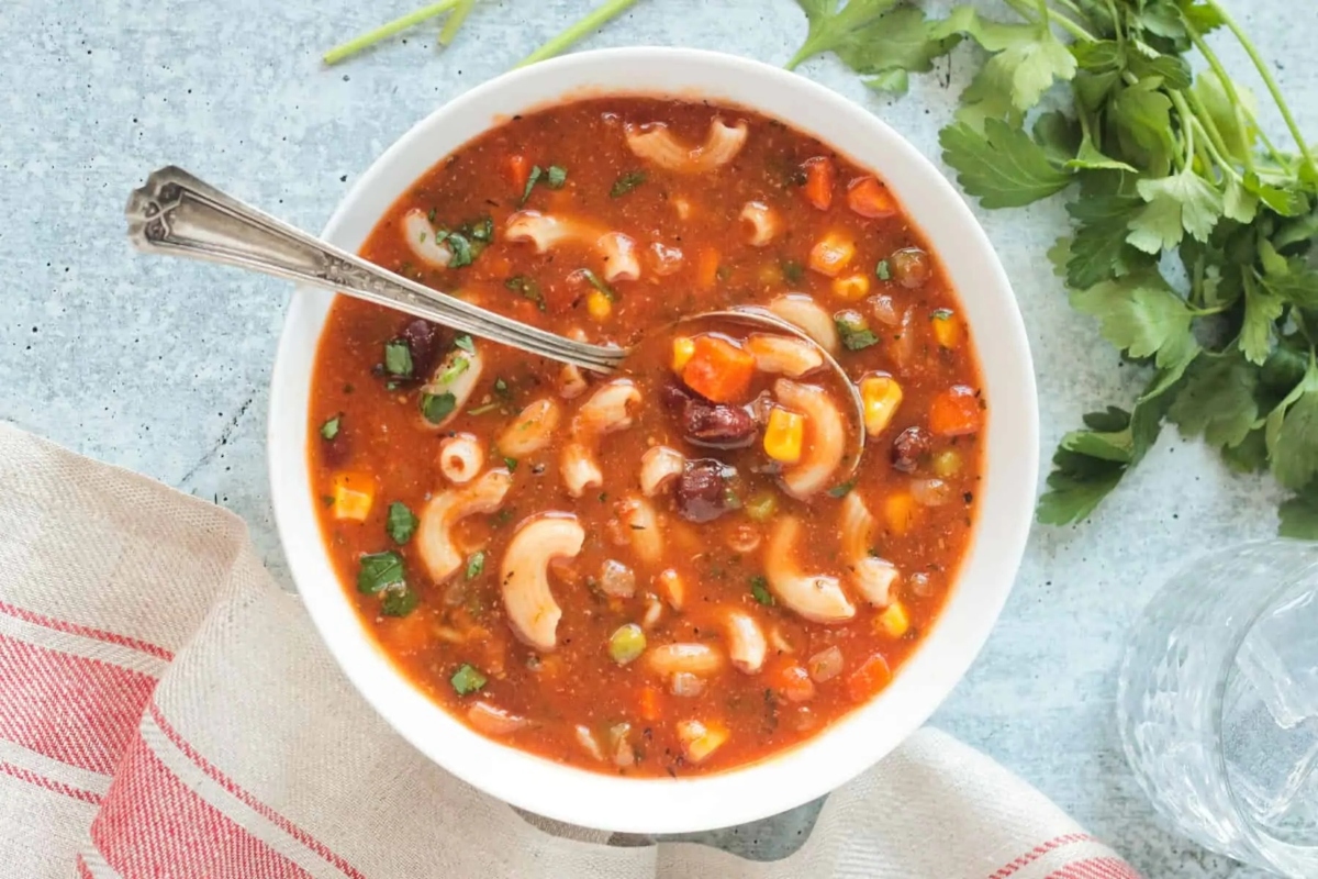 Recipe: A delicious bowl of soup with noodles and a colorful blend of frozen mixed vegetables.