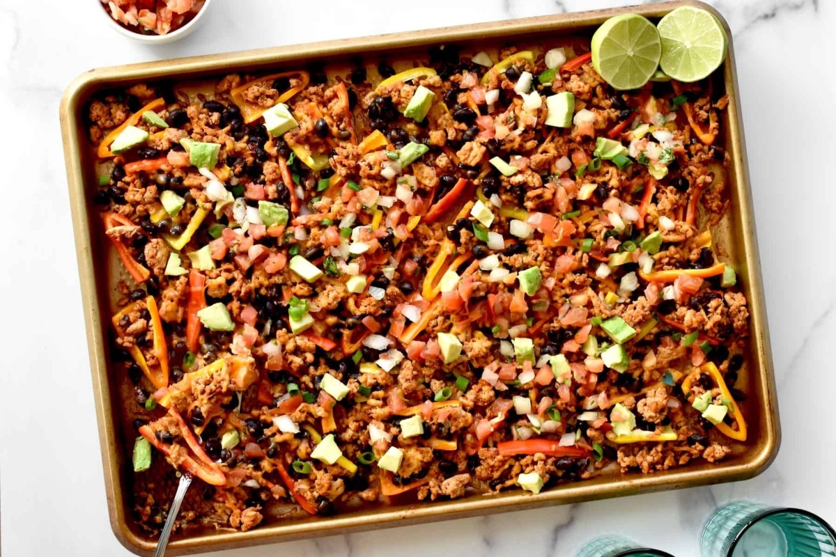 Mexican enchilada casserole on a baking sheet.