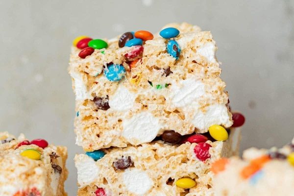 Rice krispy treats stacked on top of each other.