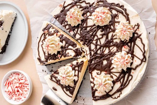 A slice of peppermint peppermint cheesecake on a plate.