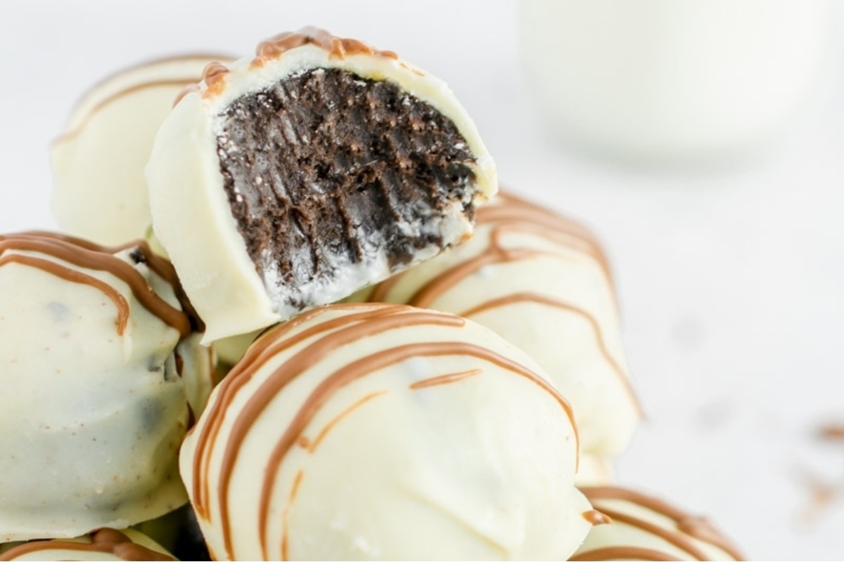 Christmas chocolate truffles with a bite taken out of them.
