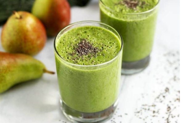 A green smoothie with chia seeds and pears.