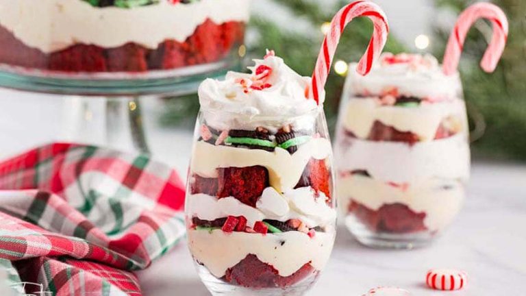 Festive red velvet trifle adorned with candy canes, perfect for Christmas.