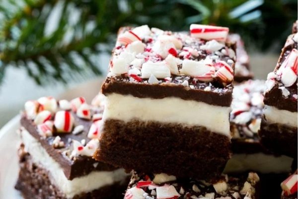 Chocolate peppermint brownies on a white plate.