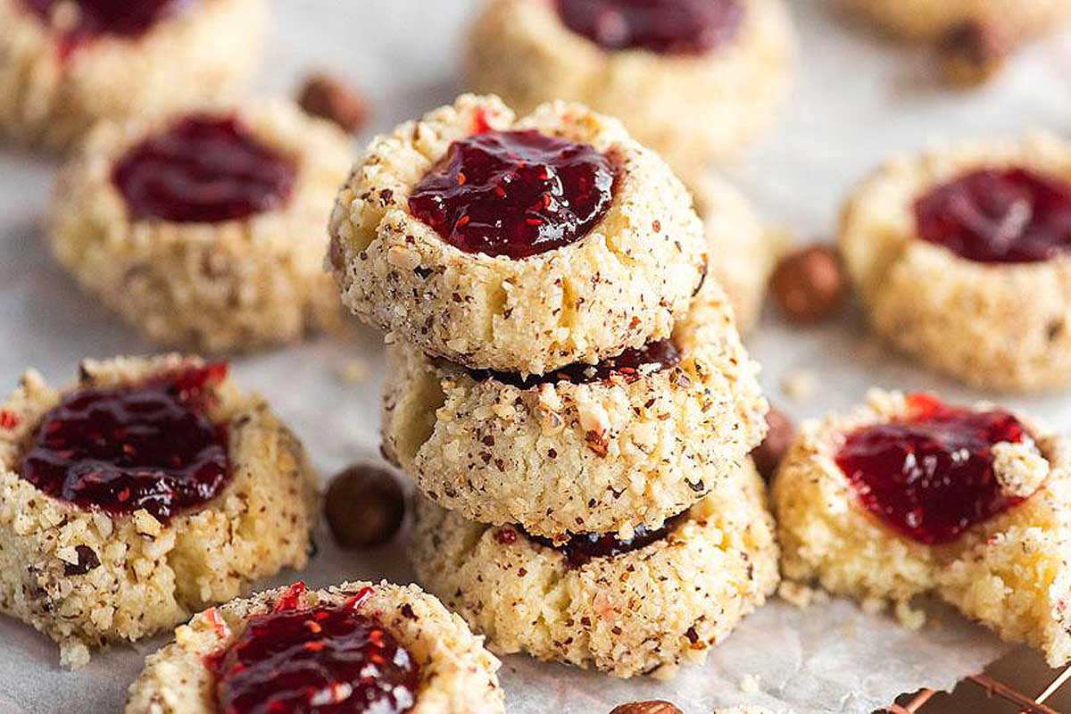 Raspberry Hazelnut Thumbprint Cookies stacked.