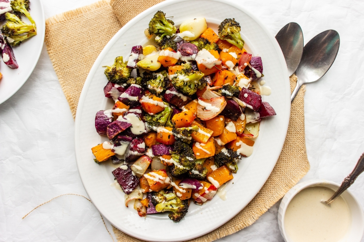 A sheet pan recipe of vegetables and sauce, perfect for Thanksgiving.