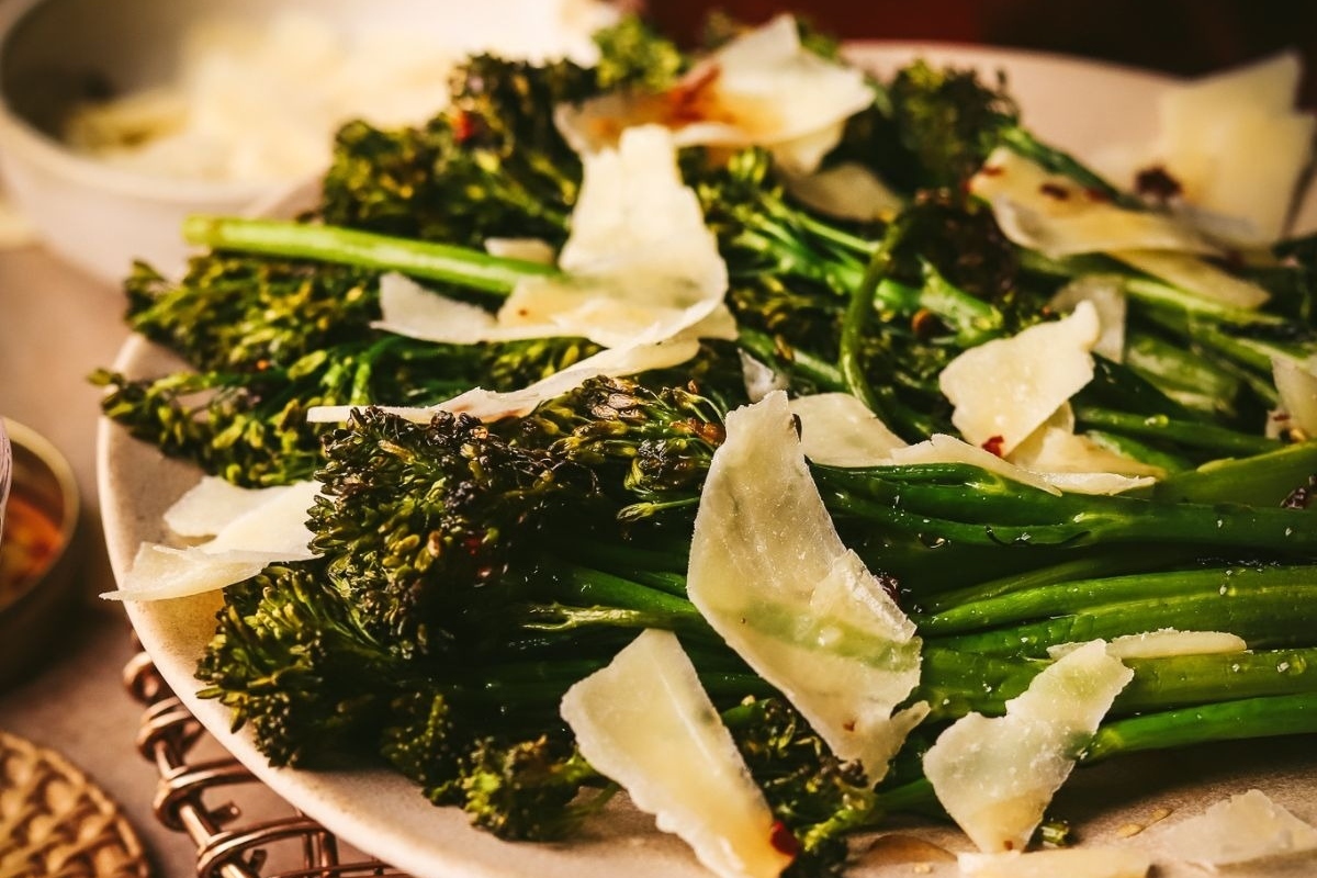 A plate with broccoli and Parmesan, perfect as a Turkey Side.