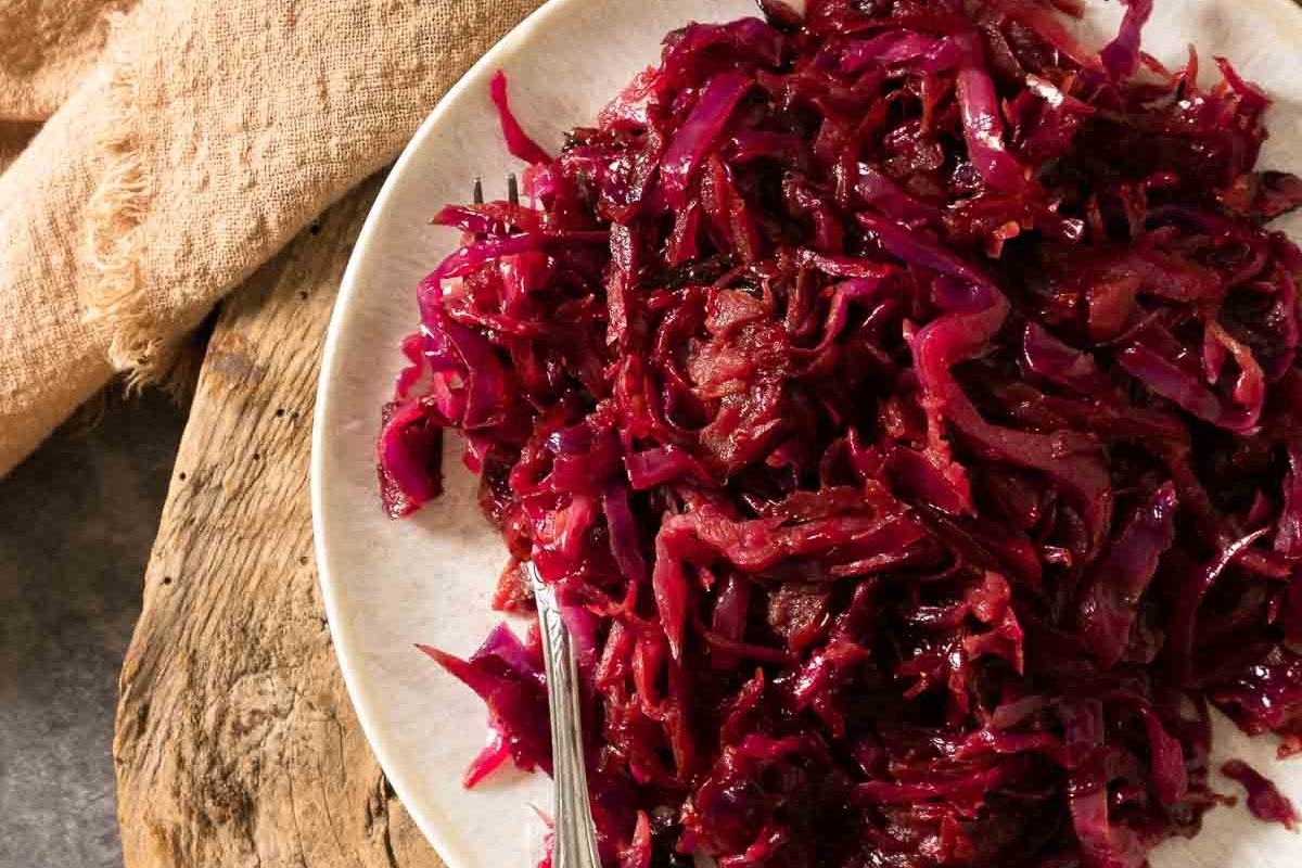 German-style red cabbage on a plate with a fork.