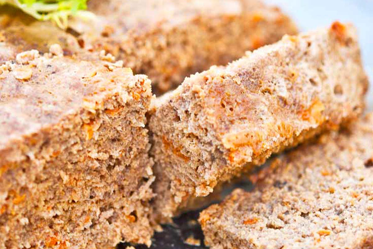A delicious slice of meatloaf on a plate.