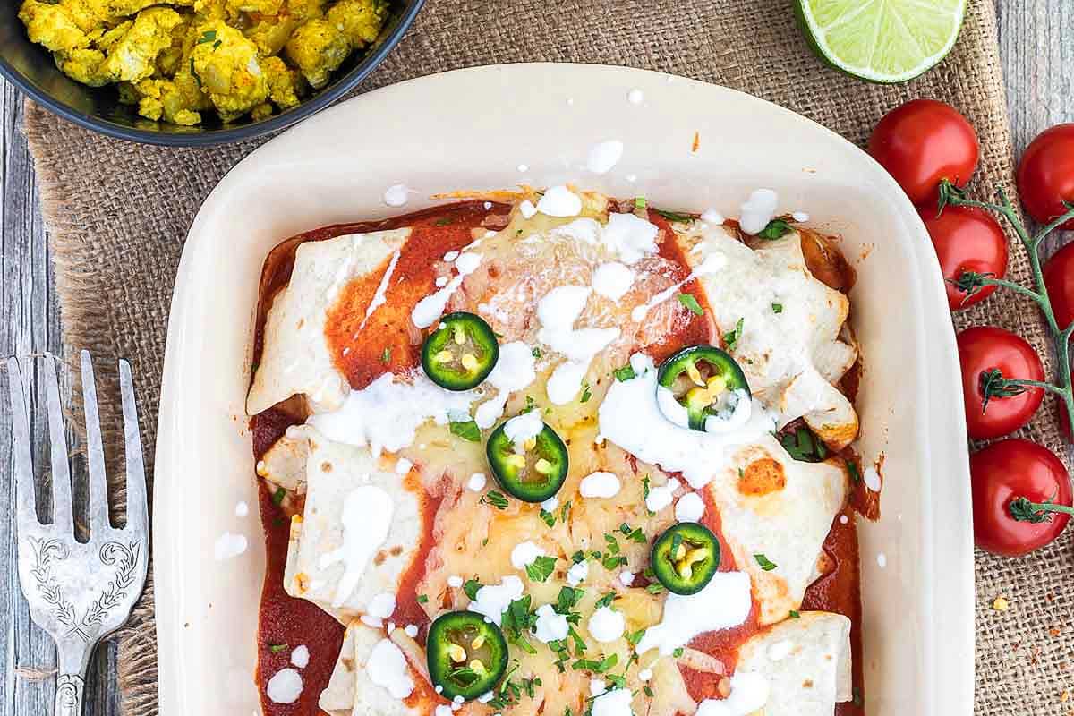 Mexican enchiladas in a baking dish.