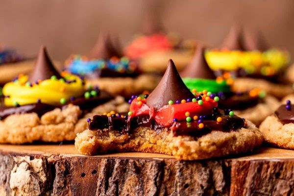 Witch hat cookies decorated with chocolate and sprinkles.
