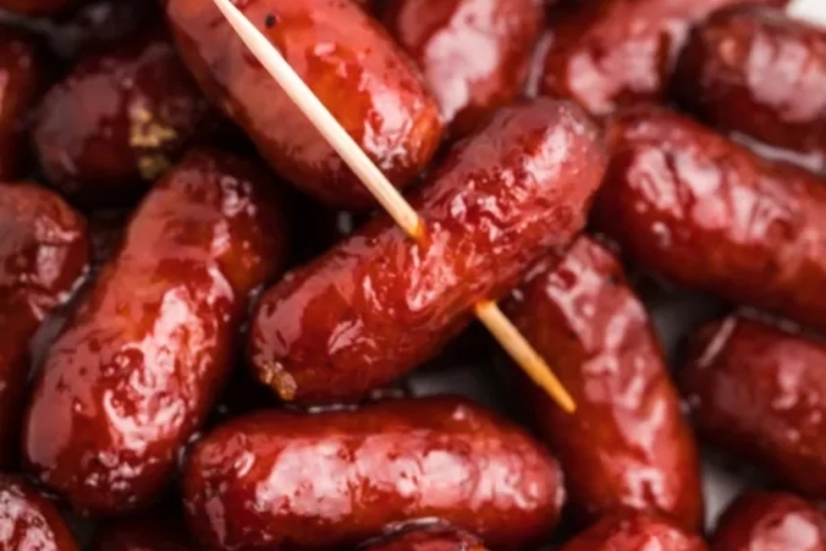The easiest game day recipe featuring sausages on a plate, held together by toothpicks.