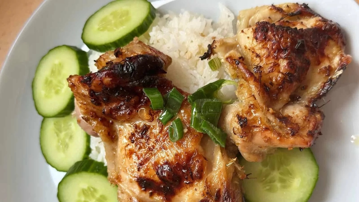 A Valentine's Day-themed plate with a mouthwatering main dish featuring chicken and cucumbers.