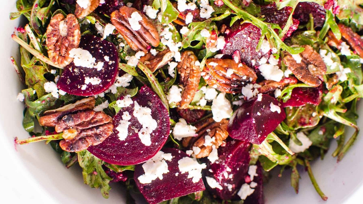Arugula beet salad on a plate.