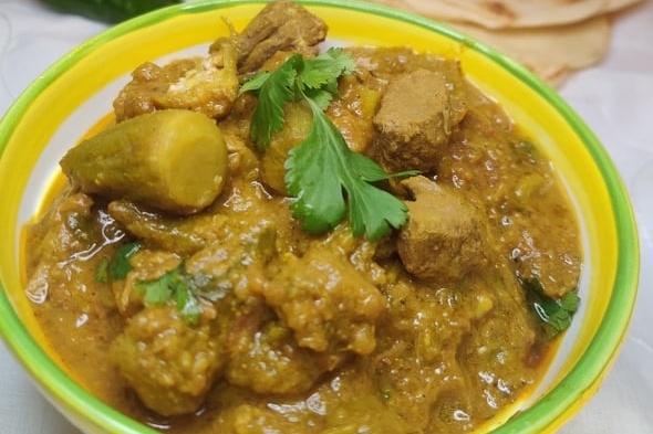 Explore savory curry recipes featuring a delectable combination of meat and vegetables, served in a comforting bowl.