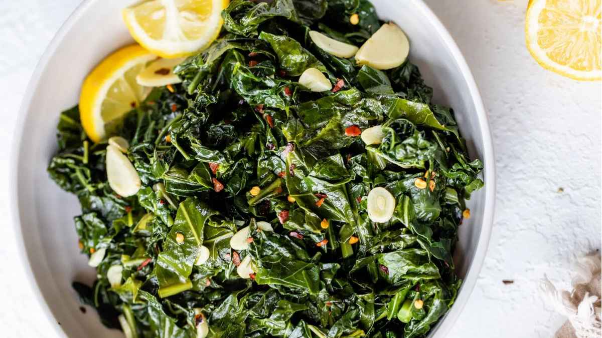 Braised greens with lemon on the side.