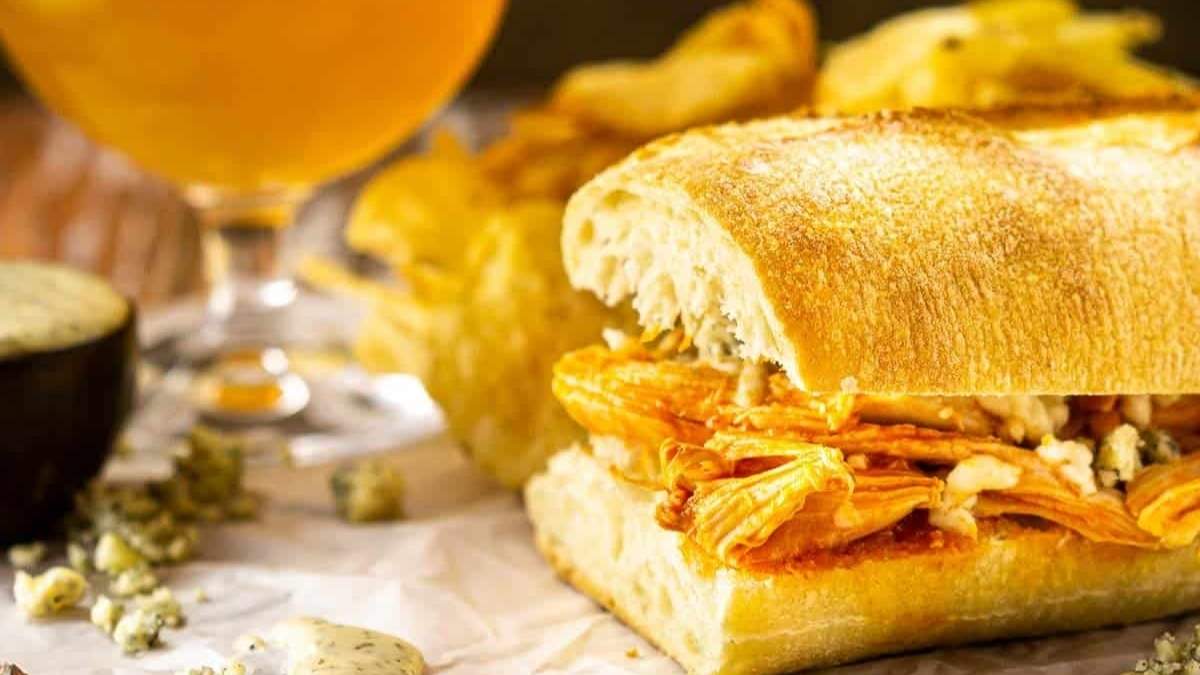 A shared round-up of comforting comfort food recipes featuring a chicken sandwich with fries and a beer.