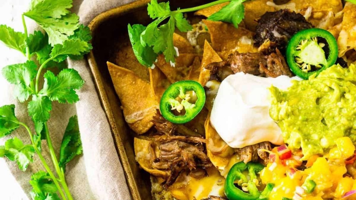 Burrata and Bubbles Sheet Pan Jerk Pork Nachos