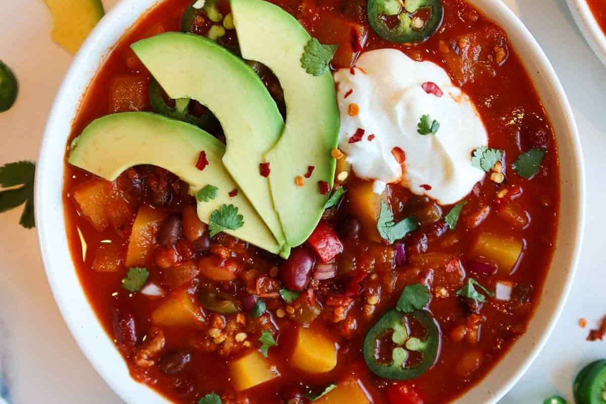 Chili recipe with avocado and sour cream.