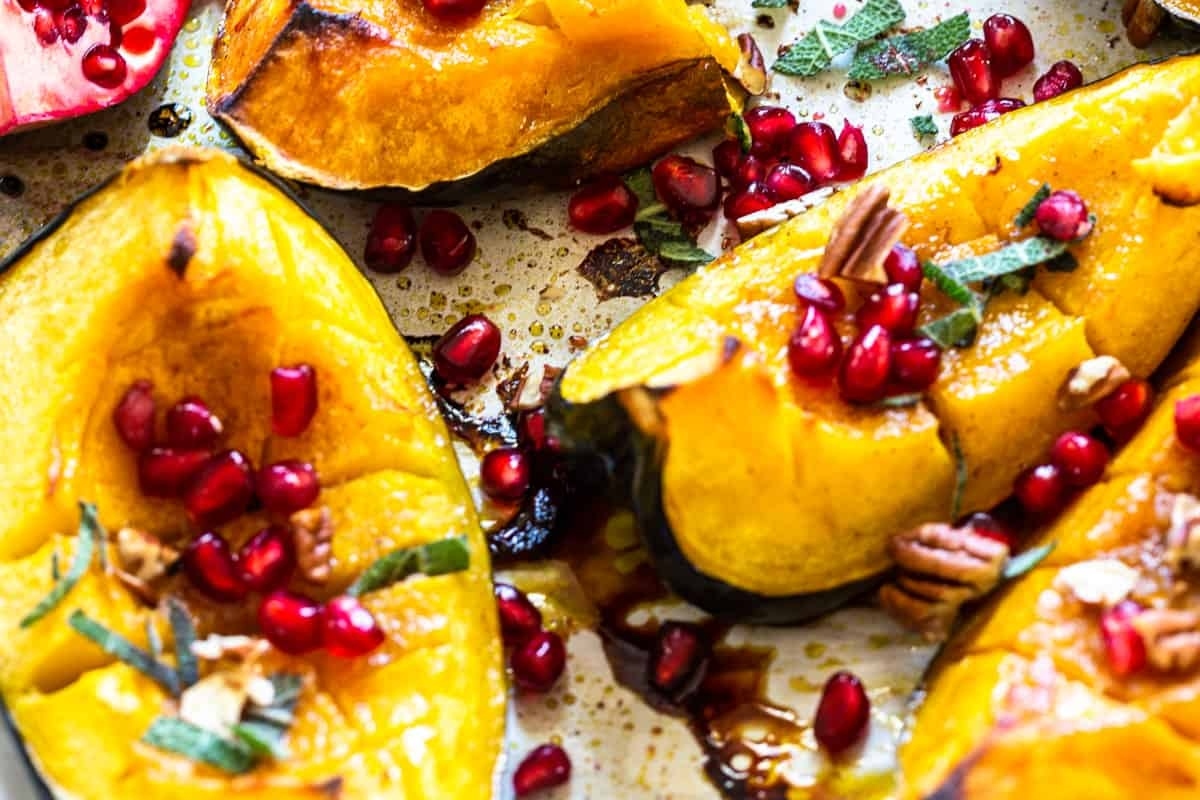 Christmas-inspired side dish that combines the natural sweetness of roasted acorn squash with the vibrant tanginess of pomegranate and pomegranate seeds.