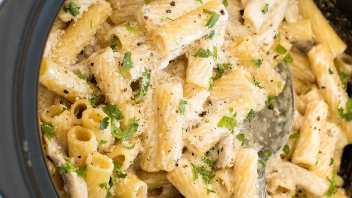 A delightful main dish for Valentine's Day - tender chicken and pasta cooked to perfection in a crock pot.