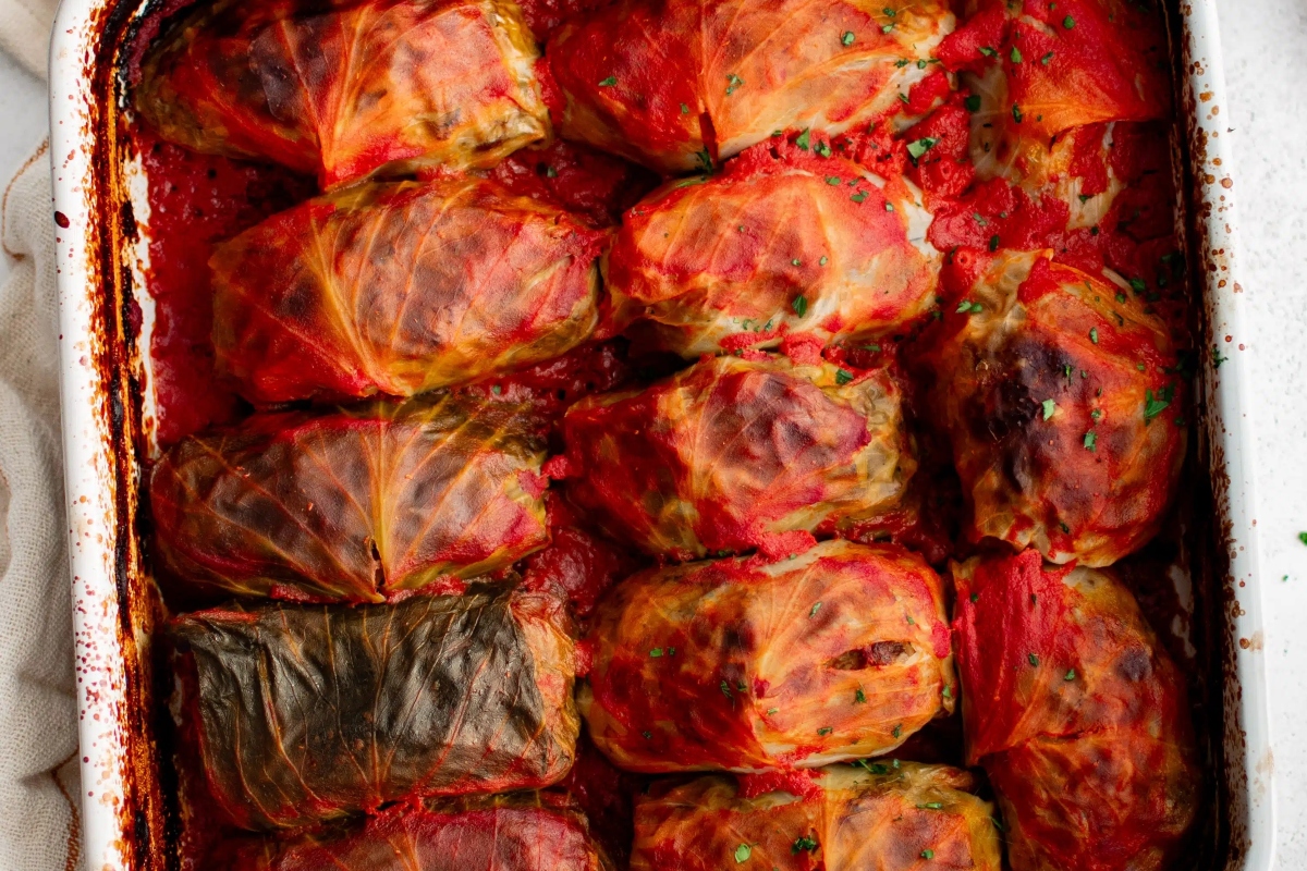 Low carb stuffed cabbage rolls in a baking dish.